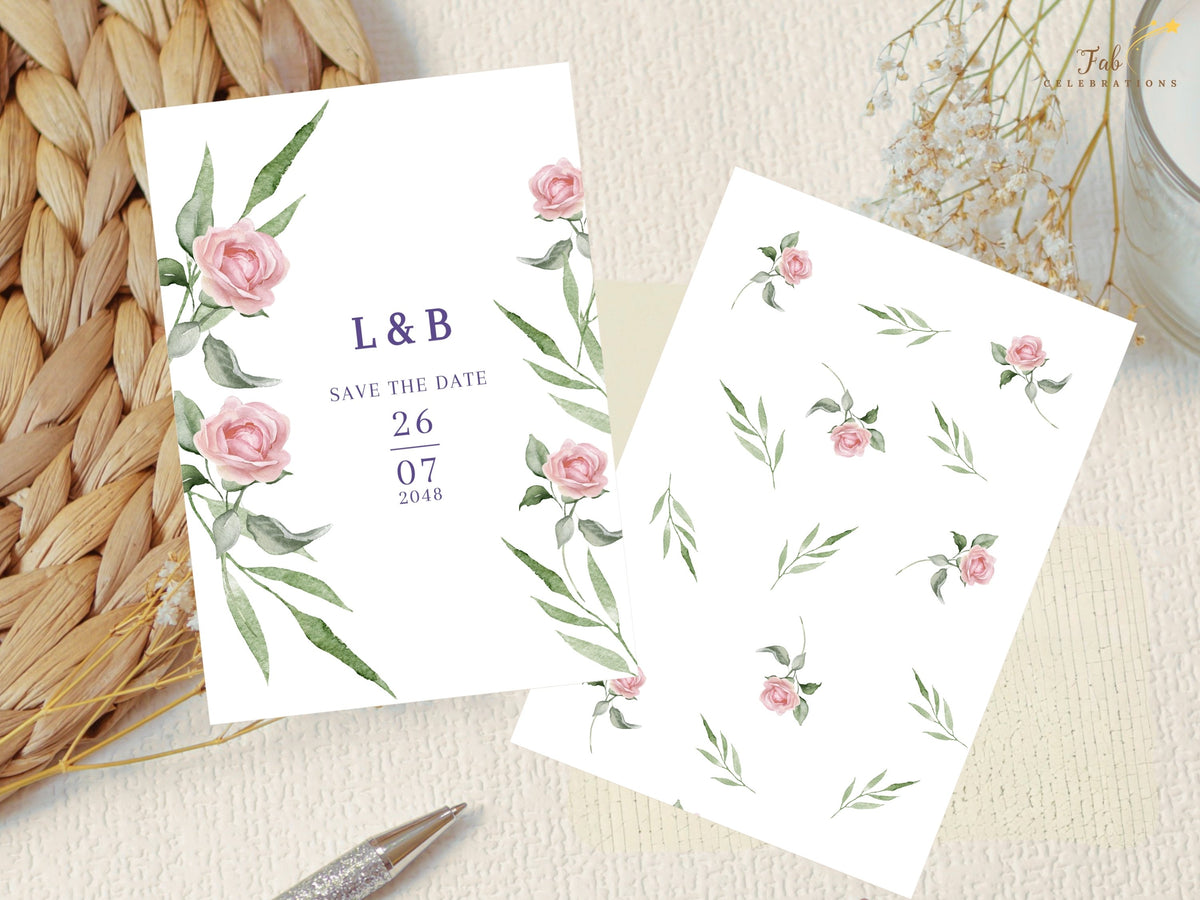 Wedding save the date card displayed beside the watercolor-inspired pink rose and green foliage elements used to create the coordinated botanical design throughout the collection.