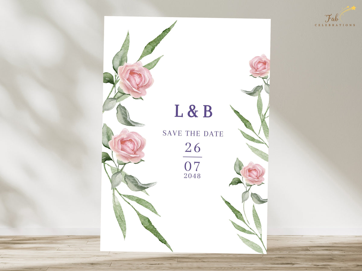 Romantic save the date card featuring watercolor-inspired blush pink roses, sweeping green foliage and elegant purple typography with the couple's initials and wedding date.