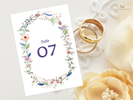 Wedding table number template with boho floral watercolor design, editable Canva format with customizable numbers, printable for rustic and garden wedding receptions.