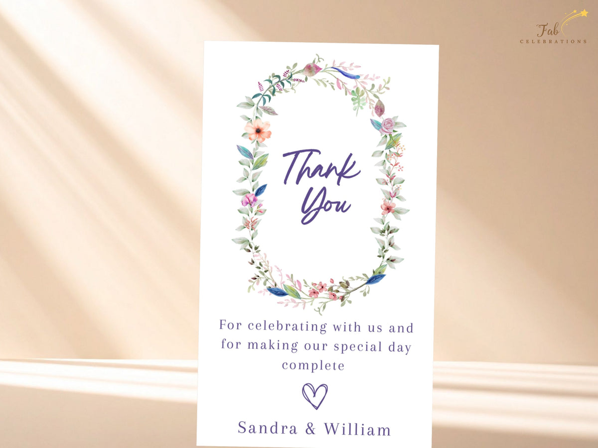 Editable Canva wedding thank you note with a watercolor-inspired floral wreath, customizable appreciation wording, elegant thank you lettering, and personalized names.