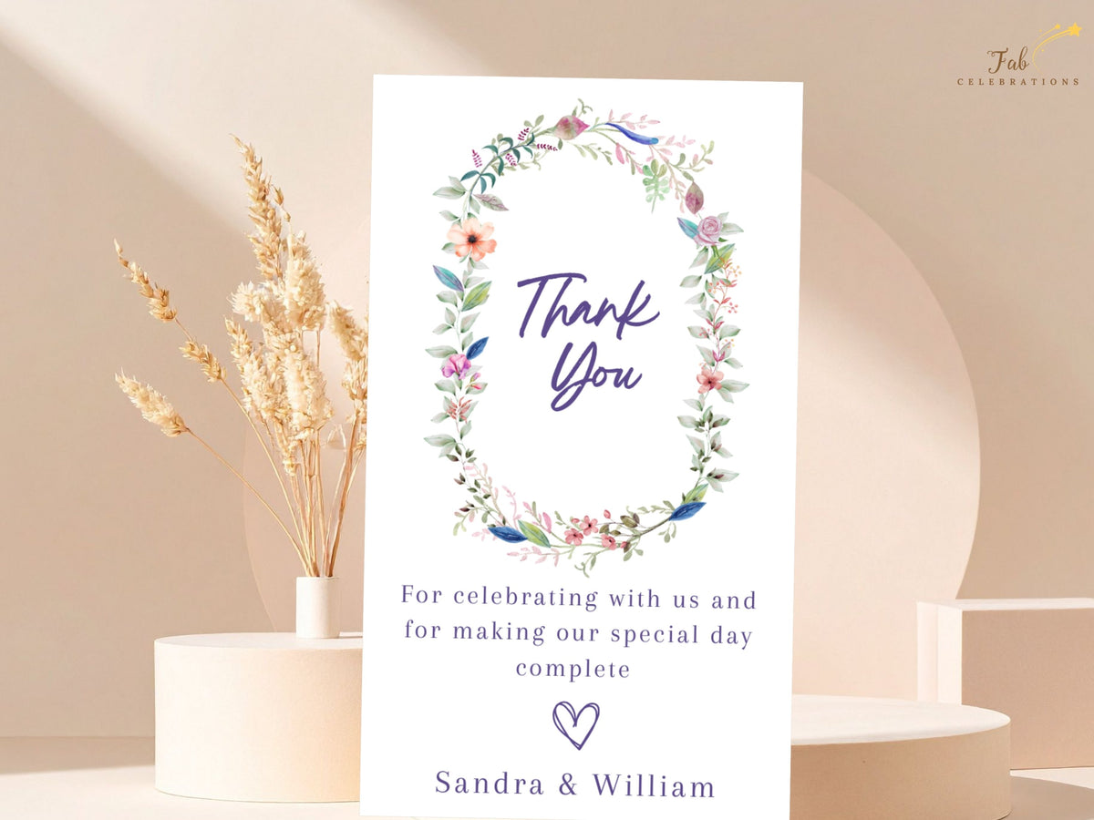 Wedding Thank You Card designed as an editable Canva template with a delicate watercolor-inspired floral wreath, personalized message, and couple names.